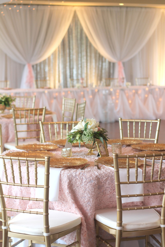 Gold chiavari chairs & gold charger plates. The dunes kamloops