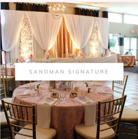 Sandman Signature Hotel wedding, blush table cloths, deluxe floral backdrop, head table lighting, blush table cloths and gold chiavari chairs